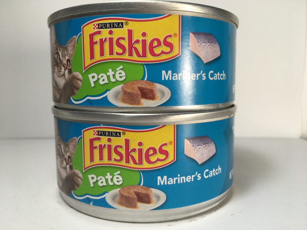 The front of two cans of delicious cat food stacked together, friskies, pate, mariner's catch