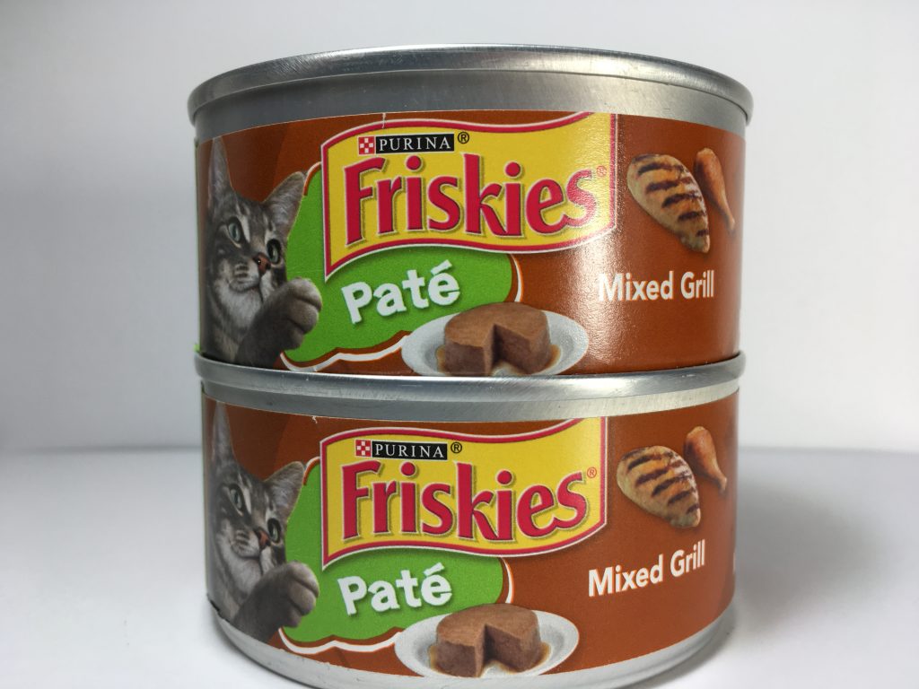 The front of two cans of delicious cat food stacked together, friskies pate, mixed grill